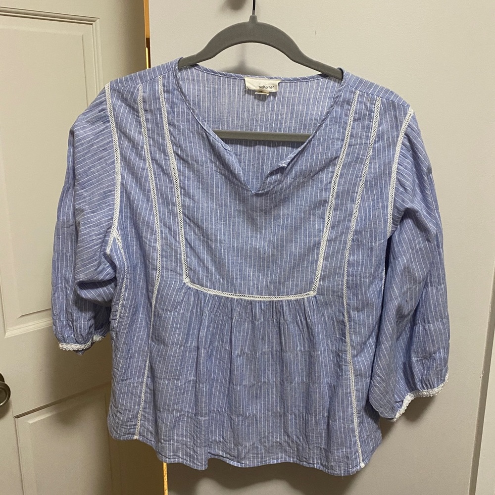 Classic blue and white striped blouse with wide 3/4 sleeves. Size L
